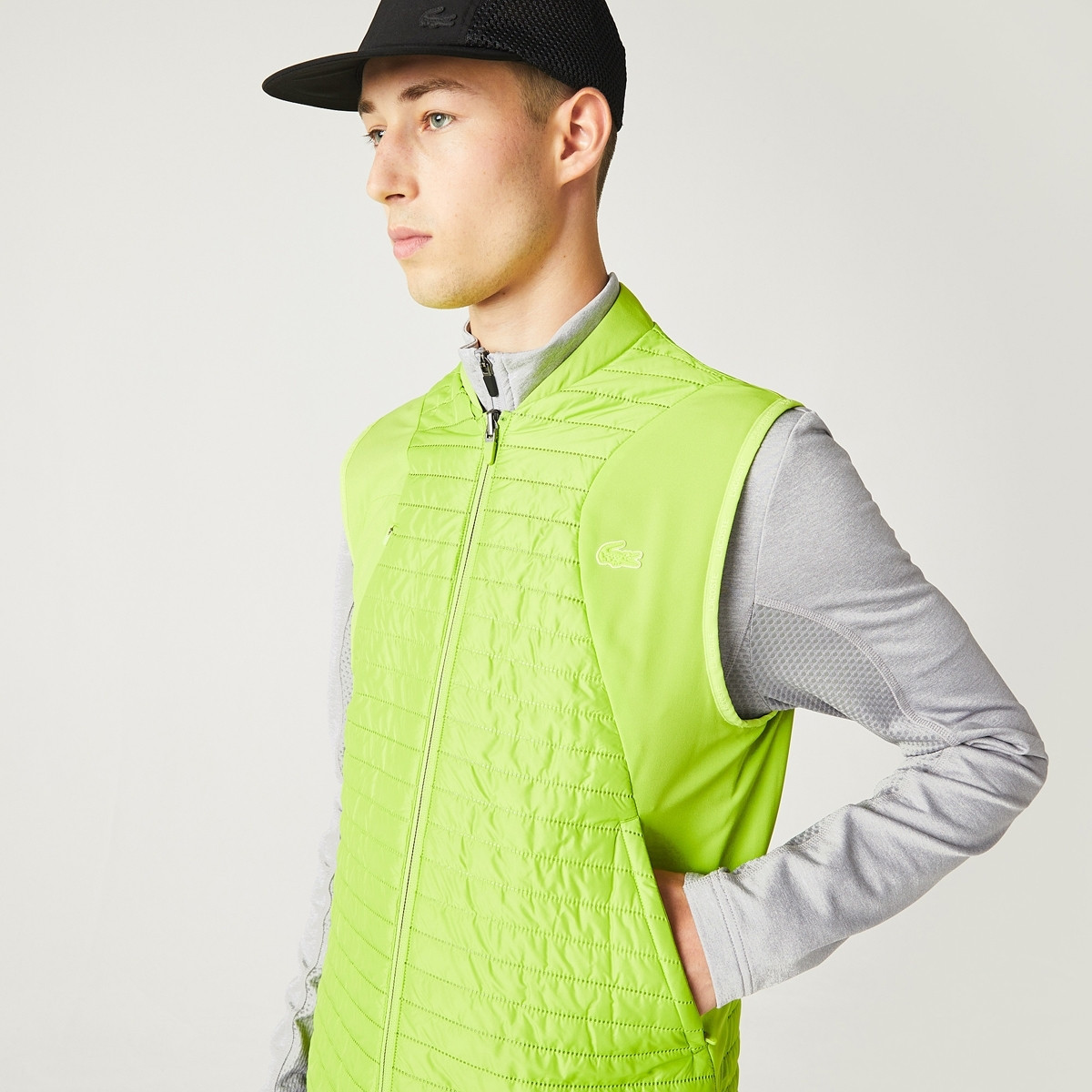 LACOSTE REVERSIBLE SLEEVELESS JACKET LACOSTE Men s Clothing Tennispro